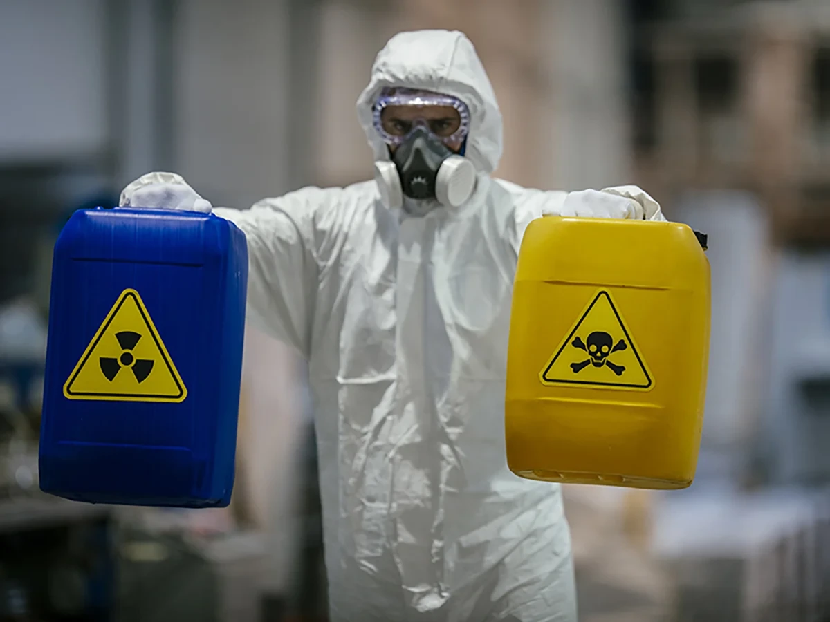 Biohazard cleanup technicians in protective equipment at a remediation scene in Hermitage, TN